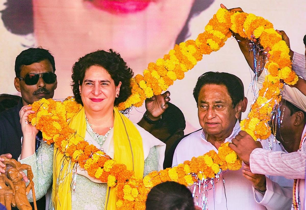  Congress general secretary Priyanka Gandhi with Madhya Pradesh Congress president Kamal Nath being garlanded during the party’s Jan Aakrosh Yatra, in Mandla district, Madhya Pradesh, on Oct. 12, 2023. 
